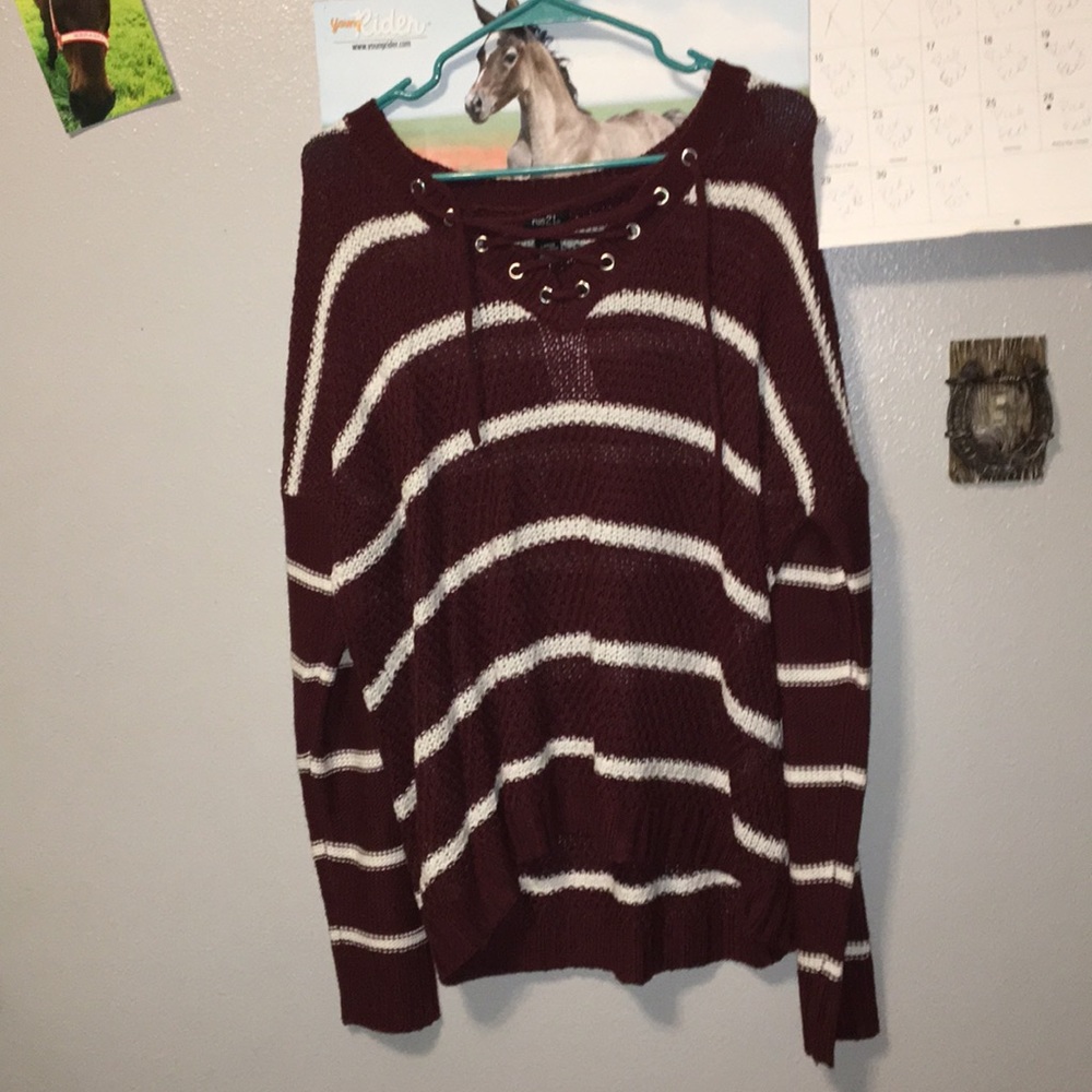 Red and white sweater NWT and size L.